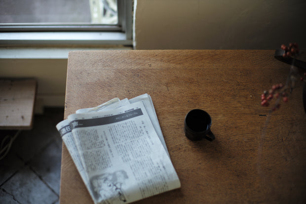 Newspaper on The Table